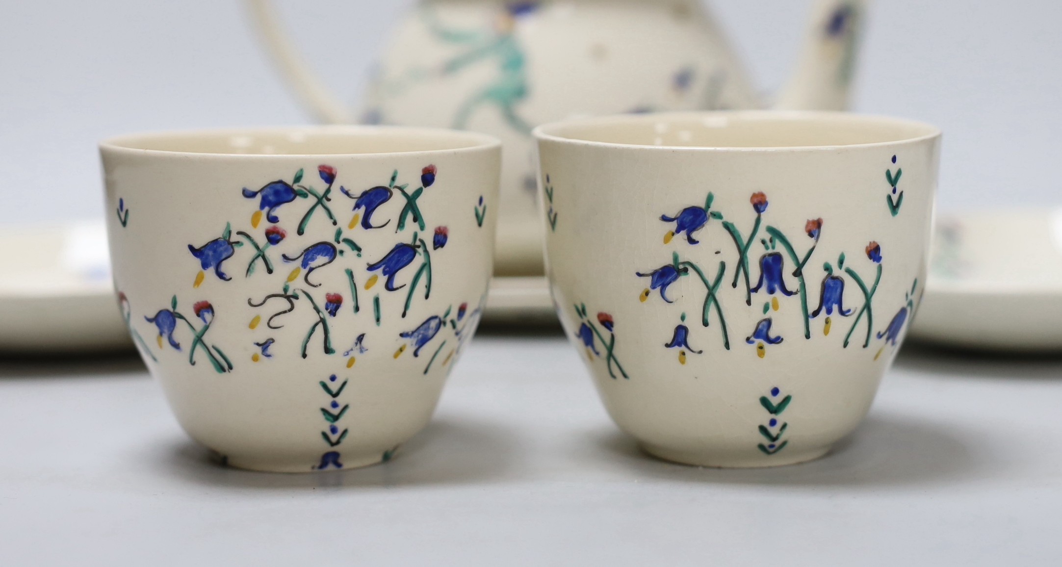 Jessie Marion King (1875-1949). The bluebells of Scotland teaset for two settings, including teapot, two cups and saucers and two tea plates